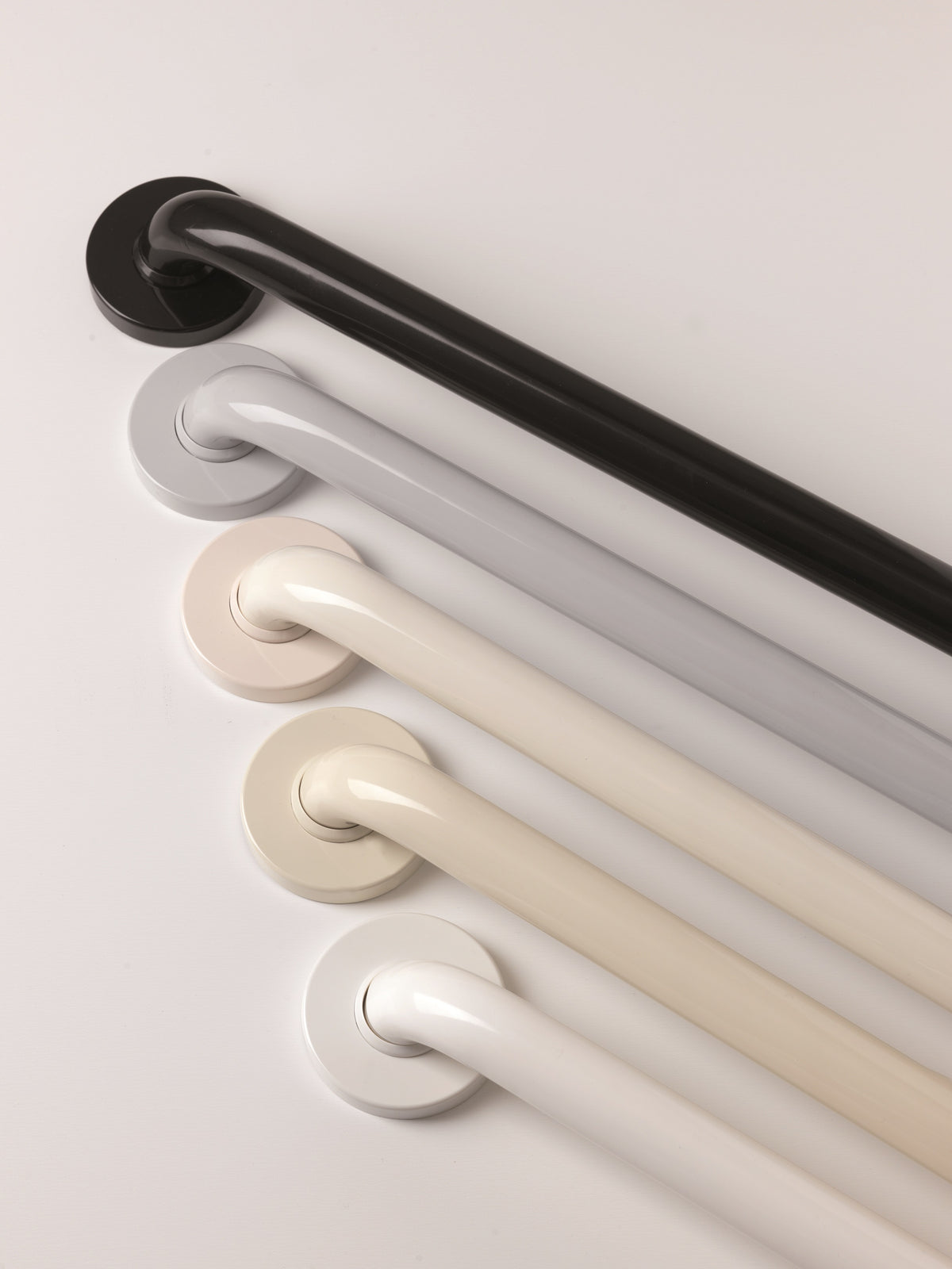 Grab bars all have a 1 ¼” diameter which makes them comfortable for both large and small hands. They are easy to clean with just dish soap and a soft cloth. Available in 5 colors and 7 lengths. All sizes are ADA rated. The 16”, 18”, 24”, 32”, 36” have a 500-pound load capacity. The 42” and 48” lengths have a 330-pound load capacity.